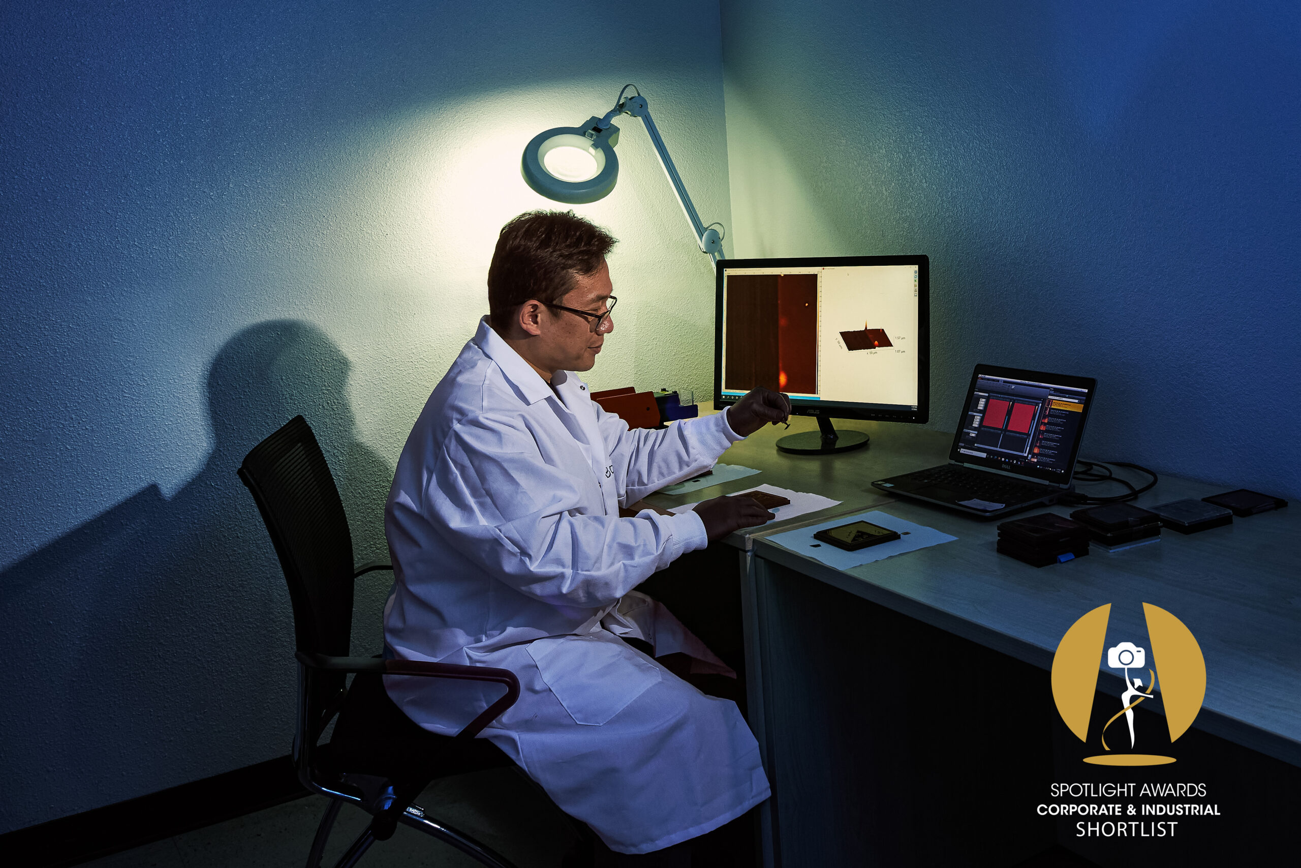 reseracher sitting at computer